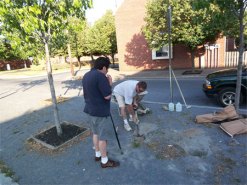 installing the memorial bench at the Broad Street Market