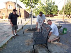 installing the memorial bench at the Broad Street Market