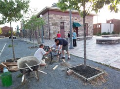 installing the memorial bench at the Broad Street Market